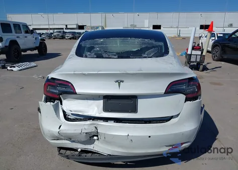 2021 Tesla Model 3 Standard Range Plus Rear-Wheel Drive from USA, damaged, VIN 5YJ3E1EA6MF854181